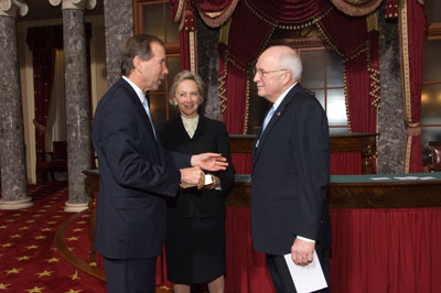 Udall mock swearing in ceremony. Three persons in image. Tom Udall on the left, his wife in the middle, and Dick Cheney on the right.</br>(Photo by U.S. Senate Photographic Studio-Rebecca Hammel)